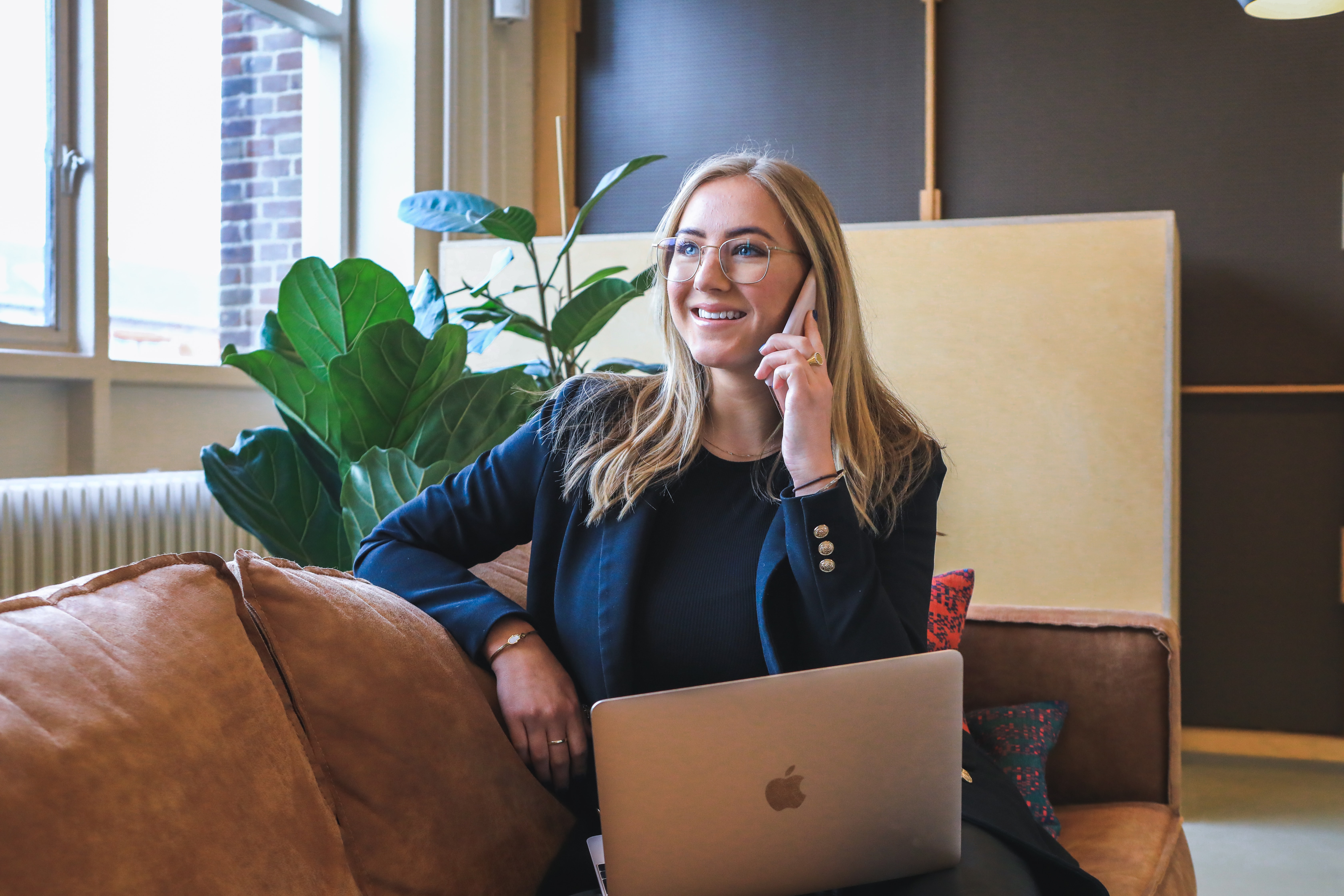 Friendly Absolute Propane customer service representative taking a call — start your propane service in Austin TX