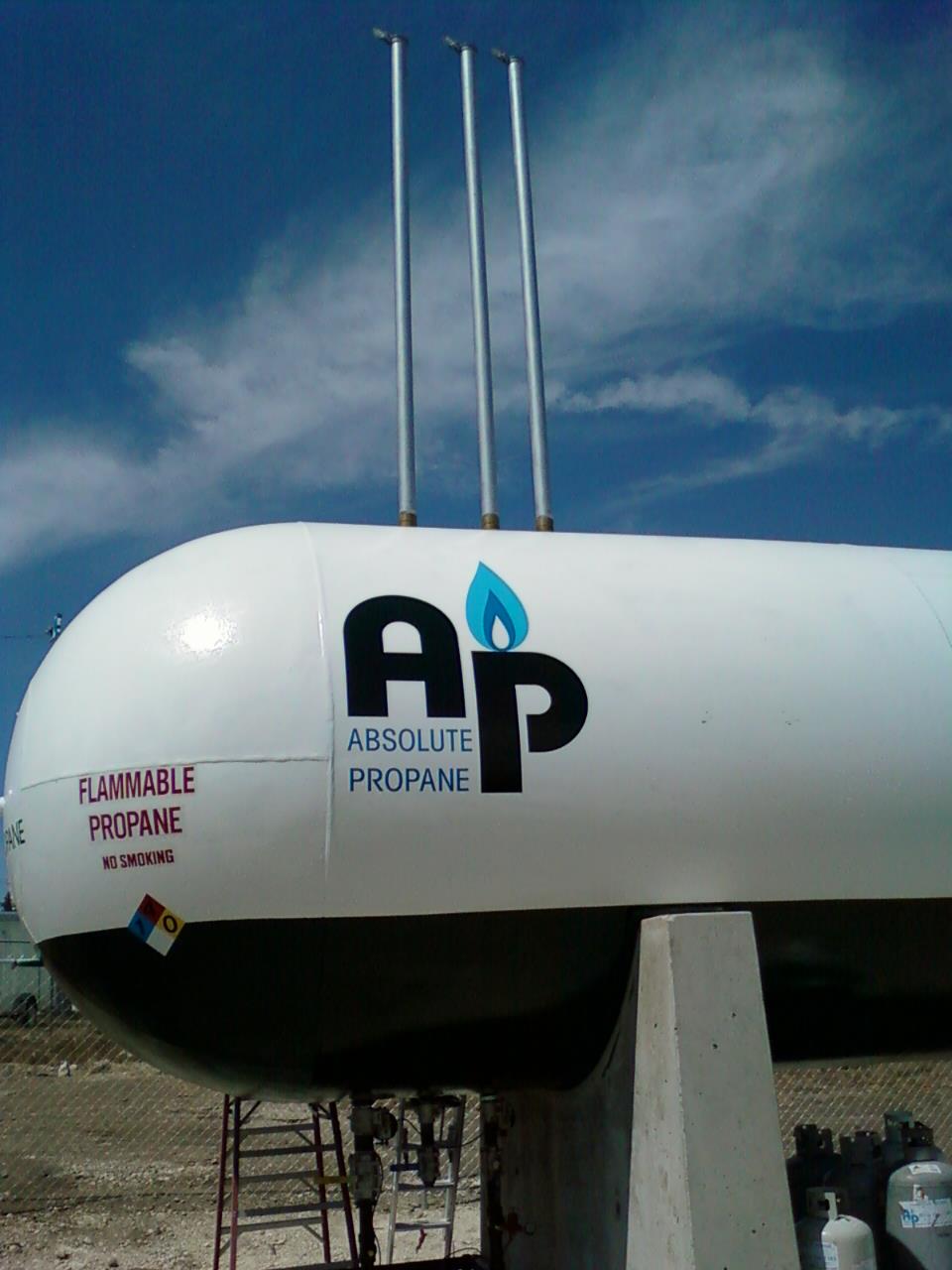 Large above-ground propane storage tank with Absolute Propane branding — automatic KEEP FULL delivery program Austin TX